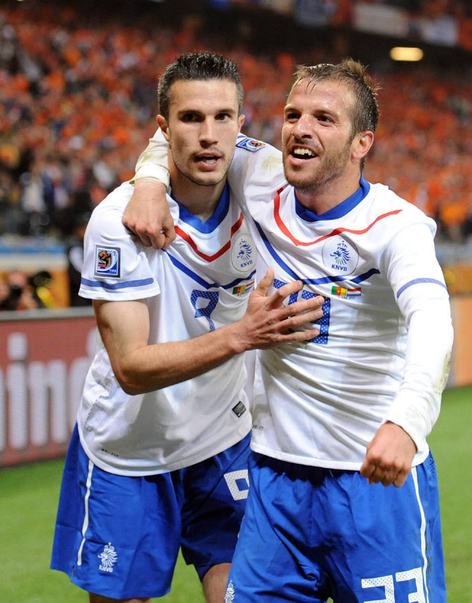 Robin van Persie (l) and Rafael van der Vaart celebrate the former's goal against Cameroon in the group stage.